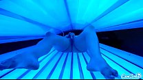 teen latina student gives lesbian pussy a massage in tanning bed