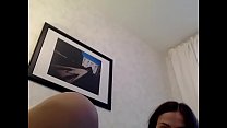 Горячая брюнетка играет с киской