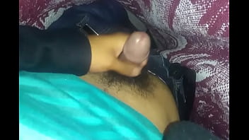 Straight stroking his penis and hairy balls