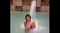 Wet girl enjoying the pool