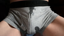 Pissing in gray underwear