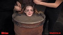 Bdsm babe trapped in a barrel and electrified