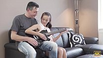 OLD4K. Young lassie makes some noise with old bass-guitar player