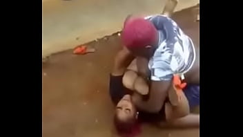Girl pressing breast in a fight