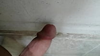 Cock cums on wall