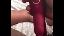Cami Love fucks her pussy with a gifted thrusting vibrator