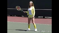 Teen Little April masturbates outdoors after tennis