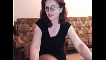 MILF with glasses on webcam