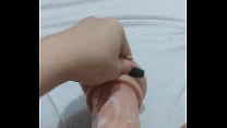 Young girl playing with dildo and enjoying a lot