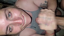 white girl receives a lot of cum on her face and sucks it deep